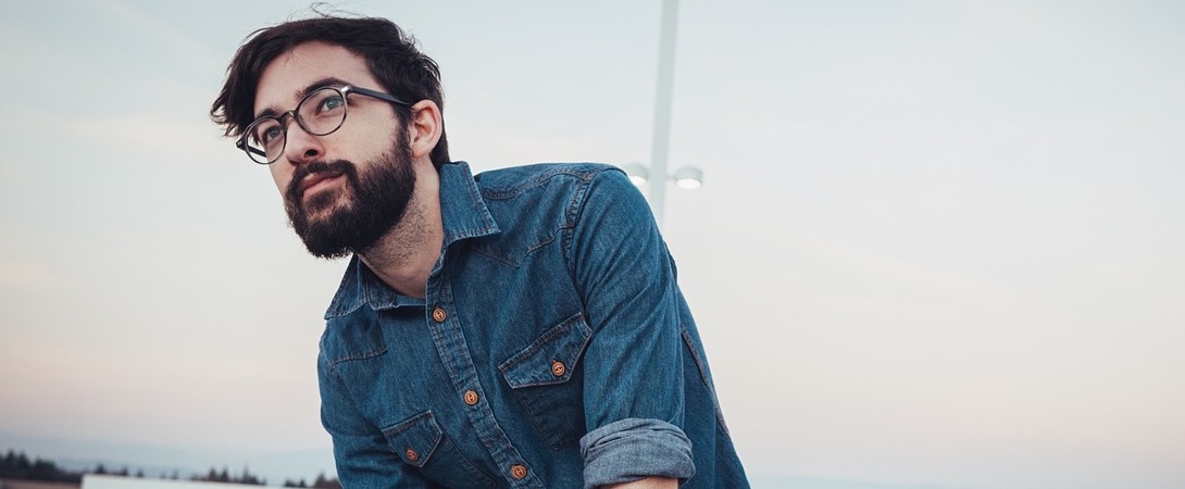 a bearded hipster with glasses