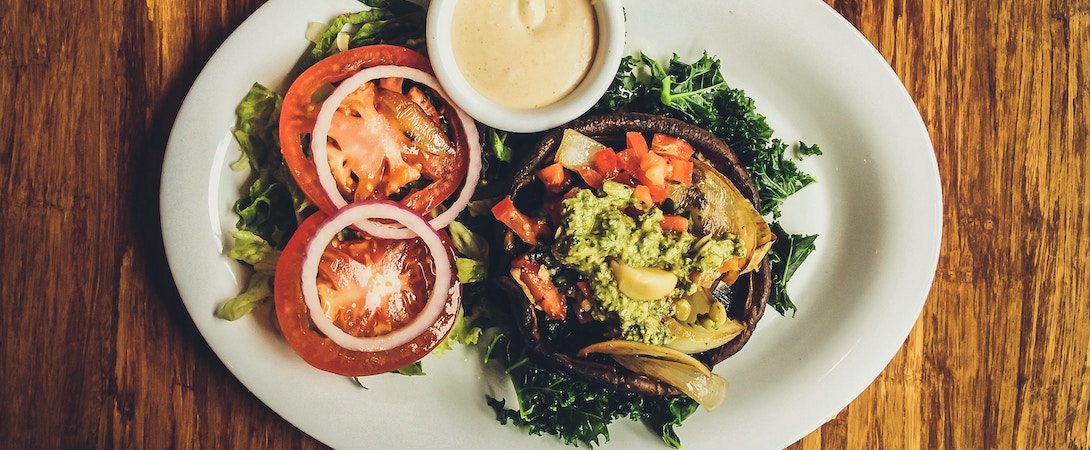 portobello burger spread on a wooden background
